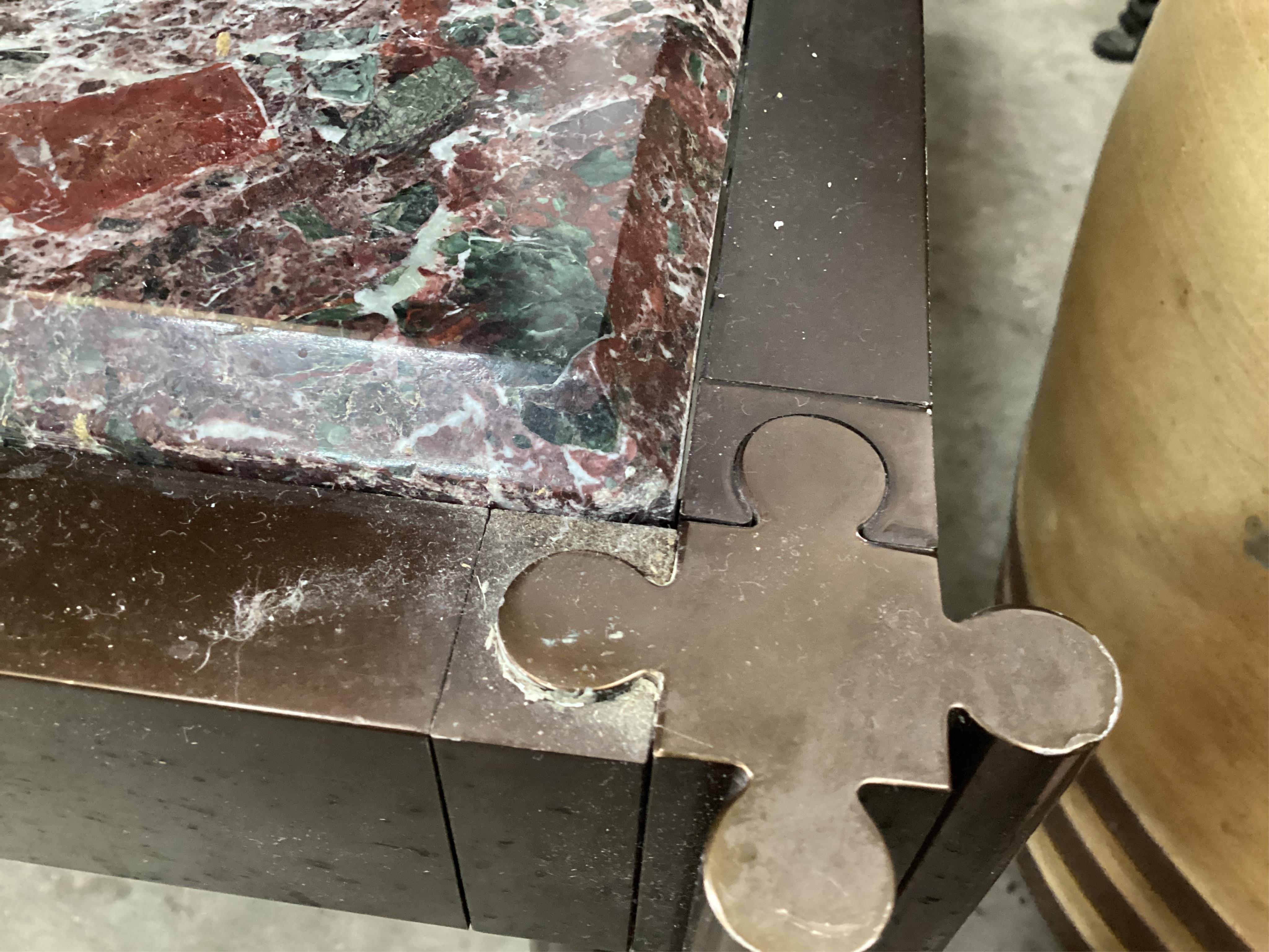 A Contemporary square marble topped brass coffee table, 110cm, height 39cm, Provenance: The late Kenneth Turner (1936-2025), celebrity florist, designer and perfume retailer, he received the Royal Warrant from the Prince